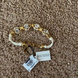 White and gold stoned bracelet